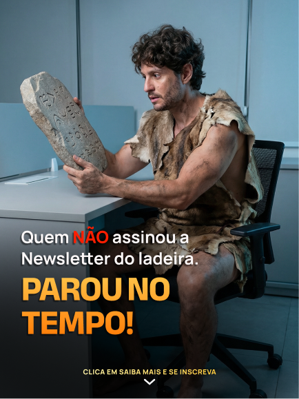 Criativo newsletter — homem das cavernas no escritório: quem não assinou parou no tempo.